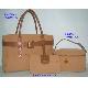 Handbag with vanity and cosmetic bag