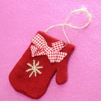 Knitted mini mitten with hand embroidery
