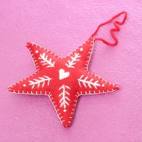 Felt fabric star with hand embroidery