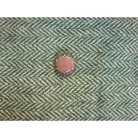 Cloth covered shank button with metal ring