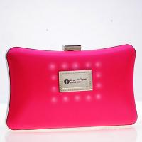 Best-selling neon pink bag with incoming call flash around the metallic label