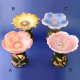 Floral oil burners, A) AP 950/1 Blossom 
B) AP 950/2 Sunflower 
C) AP 950/3 Orchid 
D) AP 950/4 Lotus