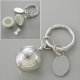 Sell Silver-plated  inchesWorld inches Pill Box Keychain