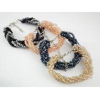 Twist necklace with eye drop pendant