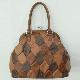 PATCHED PVC HANDBAG