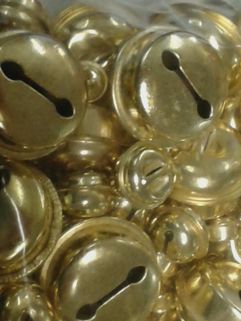set of gold coloured metall bells