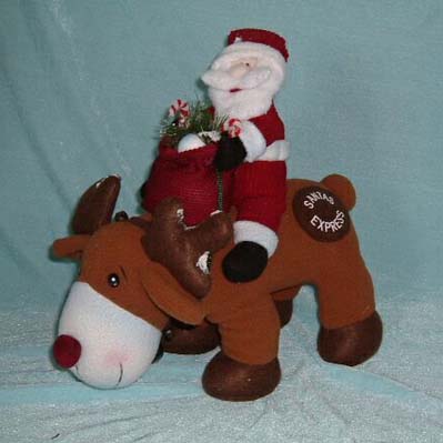 SANTA ON DEER DOLL