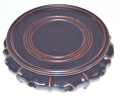 Carved Round Base In A Flower Pattern With Holes