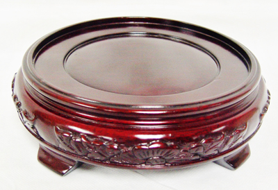 Round Base Decorated With Carved Flowers At Edges