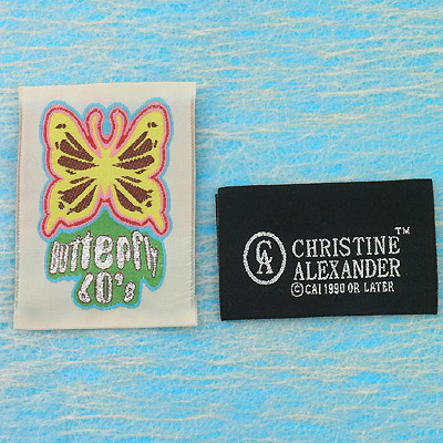 Metallic yarns woven label