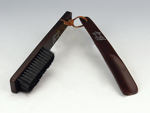 Wooden shoe horn and cloth brush