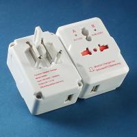 Traveller adaptor with USB charger