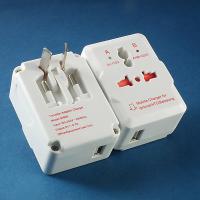 Traveller adaptor with USB charger