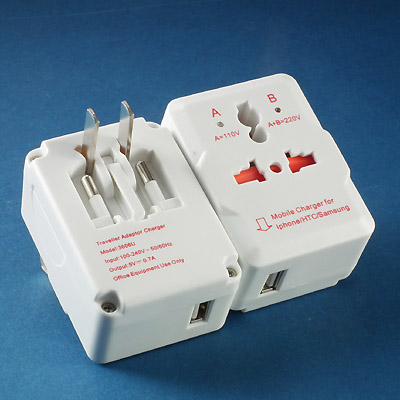 Traveller adaptor with USB charger