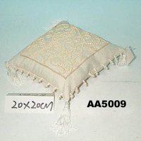 Cushion with wooden beads