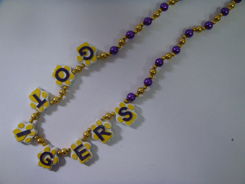 HANDSTRUNG/MOT W/MEDALLION