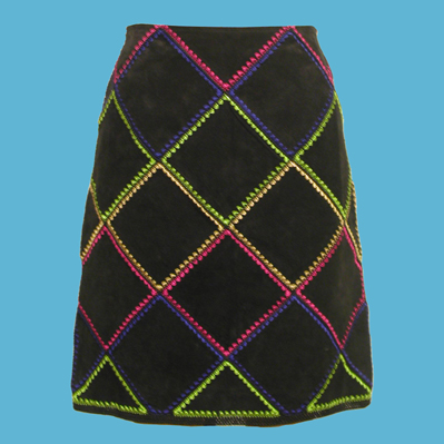 LADIES' SUEDE SKIRT W/RAYON CROCHET TRIM.