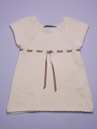 Knit dress with velvet bow at waist