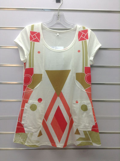 Ladies' tunics with printed on front.